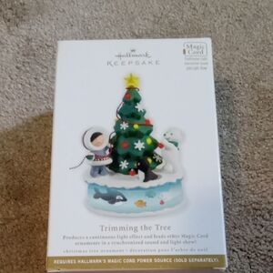 Hallmark Keepsake Ornament with Green Tree and White Snow